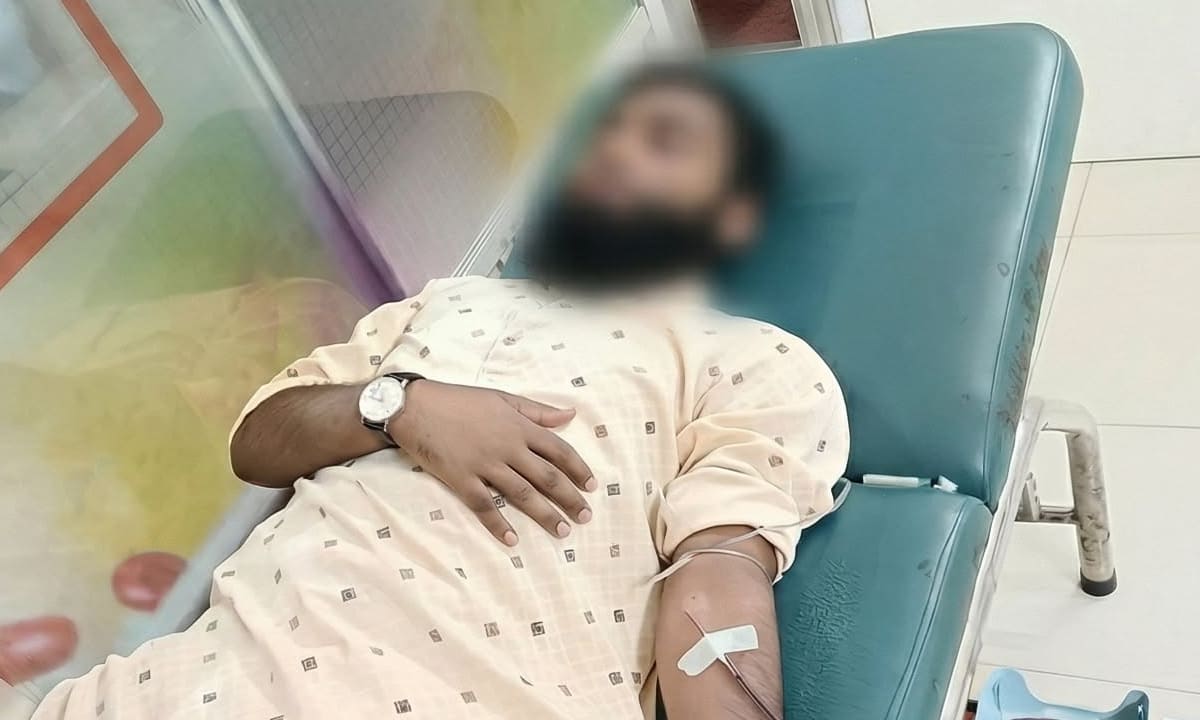 Donor seated in recovery after donating blood.